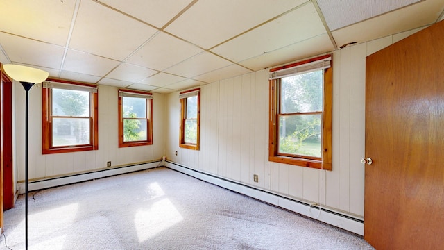 84 Elm St, Sabattus, ME 04280 - carpeted spare room featuring a paneled ceiling and baseboard heating