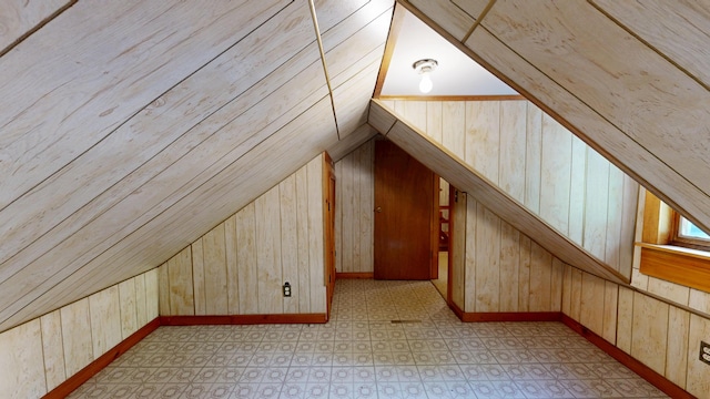 84 Elm St, Sabattus, ME 04280 - additional living space with vaulted ceiling and wood walls