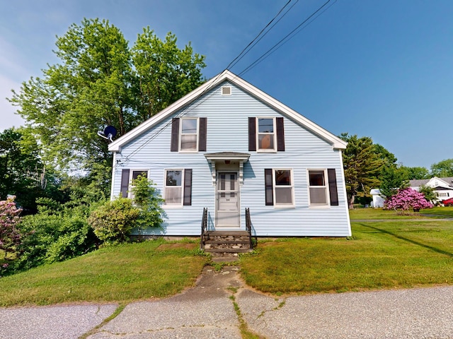 84 Elm St, Sabattus, ME 04280 - view of front facade featuring a front lawn