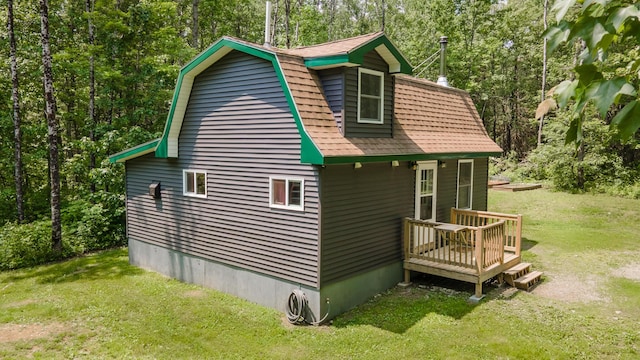 711 Stetson Rd, Exeter, ME 04435 - view of side of property with a yard and a gambrel roof