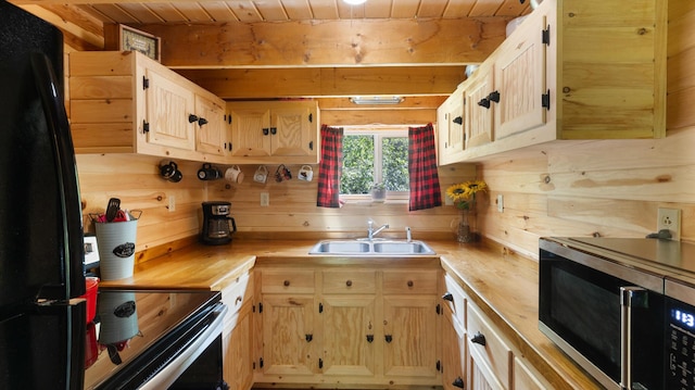 711 Stetson Rd, Exeter, ME 04435 - kitchen featuring stainless steel microwave, freestanding refrigerator, wood ceiling, light brown cabinets, and electric range oven
