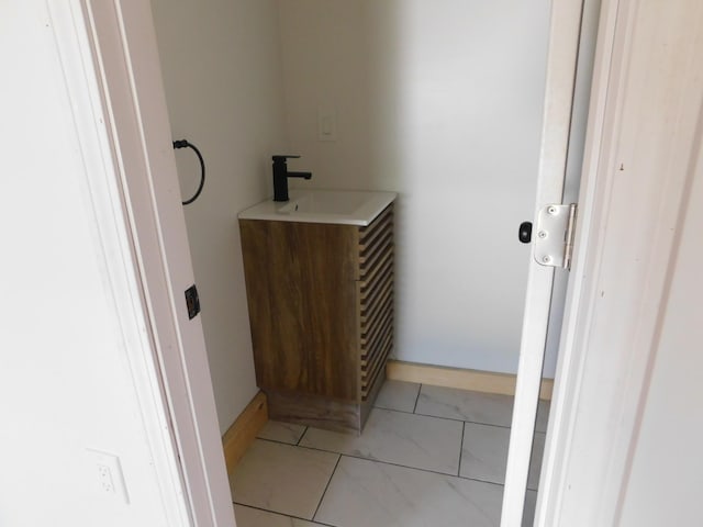 27 Main St, Norridgewock, ME 04957 - bathroom with vanity and baseboards
