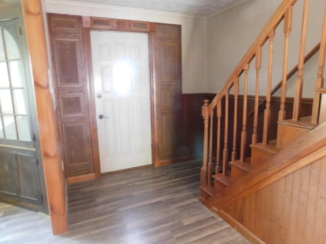 27 Main St, Norridgewock, ME 04957 - foyer entrance with stairway, wood finished floors, a wainscoted wall, and crown molding