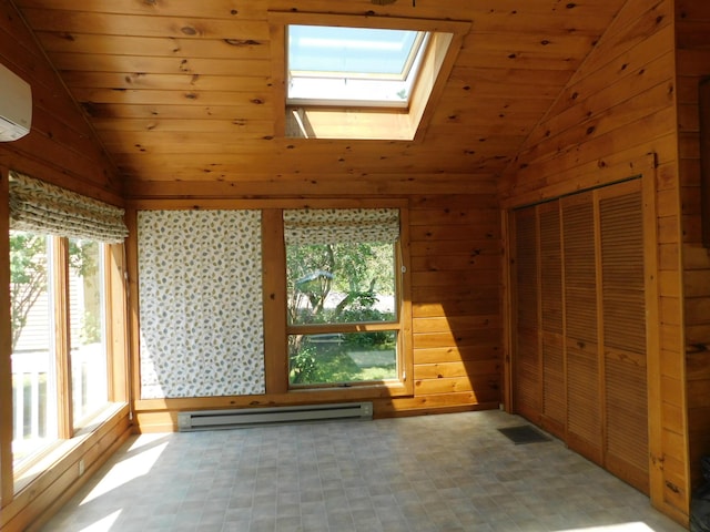 27 Main St, Norridgewock, ME 04957 - unfurnished sunroom featuring a baseboard radiator, vaulted ceiling, a skylight, and an AC wall unit