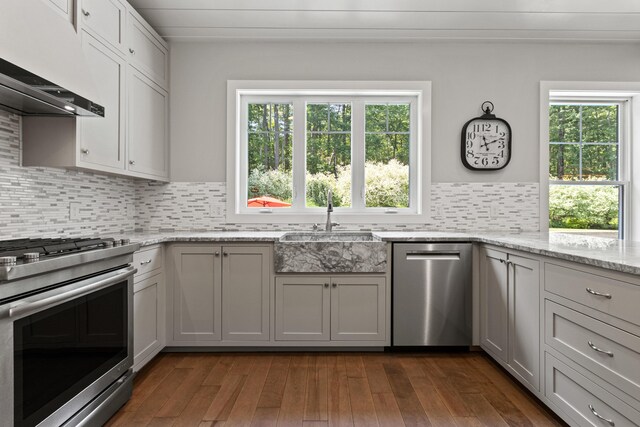 56 Ledgewood Dr, Falmouth, ME 04105 - kitchen featuring stainless steel appliances, extractor fan, decorative backsplash, light stone countertops, and dark wood-type flooring