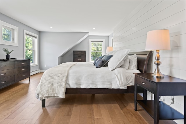 56 Ledgewood Dr, Falmouth, ME 04105 - bedroom with a baseboard radiator, wood finished floors, and recessed lighting