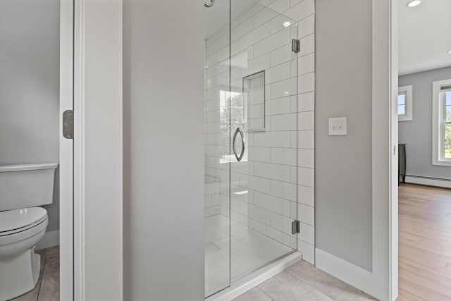 56 Ledgewood Dr, Falmouth, ME 04105 - bathroom featuring a shower stall and a baseboard heating unit
