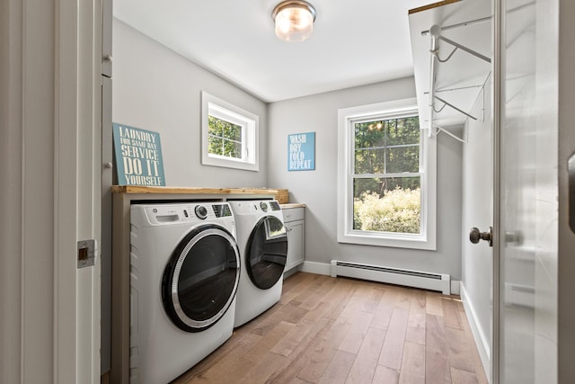 56 Ledgewood Dr, Falmouth, ME 04105 - laundry room featuring a baseboard heating unit, cabinet space, independent washer and dryer, and plenty of natural light