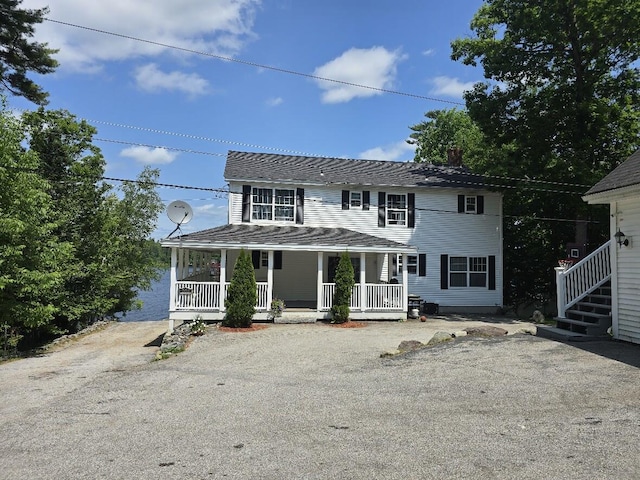 269 Bruckoff Rd, Clifton, ME 04428 - view of front facade featuring covered porch and roof with shingles