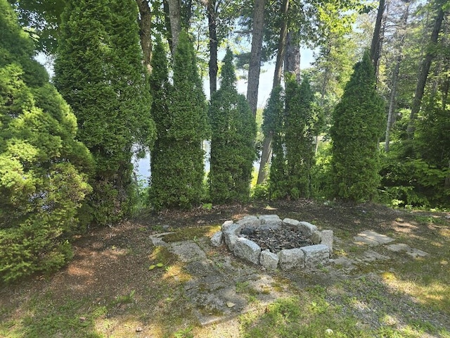 269 Bruckoff Rd, Clifton, ME 04428 - view of yard featuring a fire pit