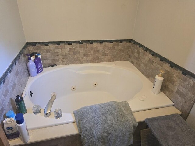 269 Bruckoff Rd, Clifton, ME 04428 - bathroom featuring a jetted tub