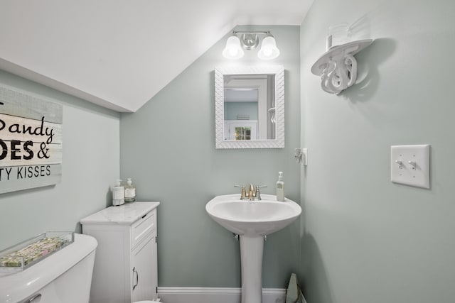 18 Frontier Way Unit 162, Arundel, ME 04046 - half bathroom featuring toilet and lofted ceiling