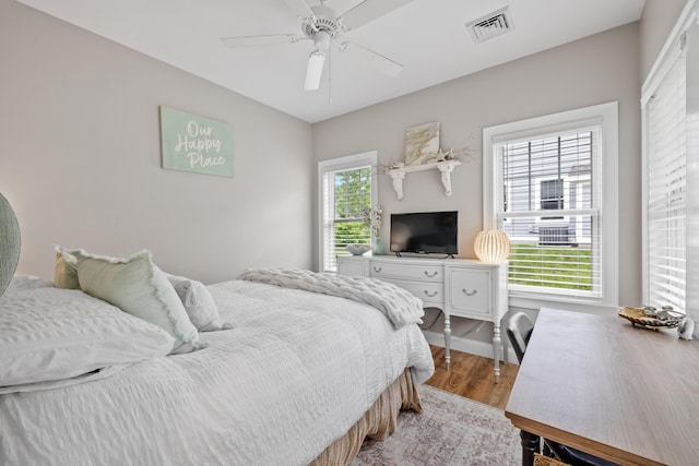 18 Frontier Way Unit 162, Arundel, ME 04046 - bedroom featuring wood finished floors and a ceiling fan