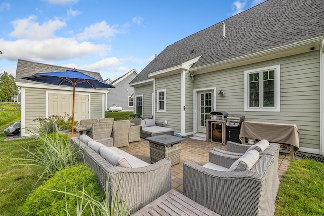 18 Frontier Way Unit 162, Arundel, ME 04046 - view of patio / terrace with an outdoor hangout area and grilling area