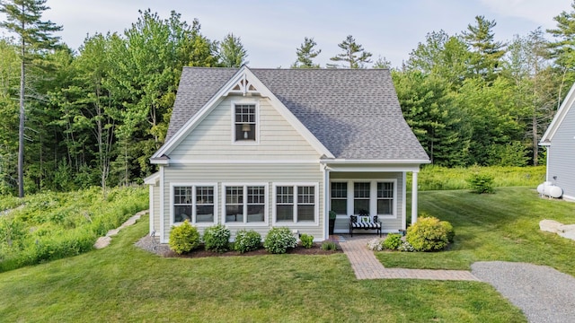 18 Frontier Way Unit 162, Arundel, ME 04046 - view of front facade with a front yard and a shingled roof