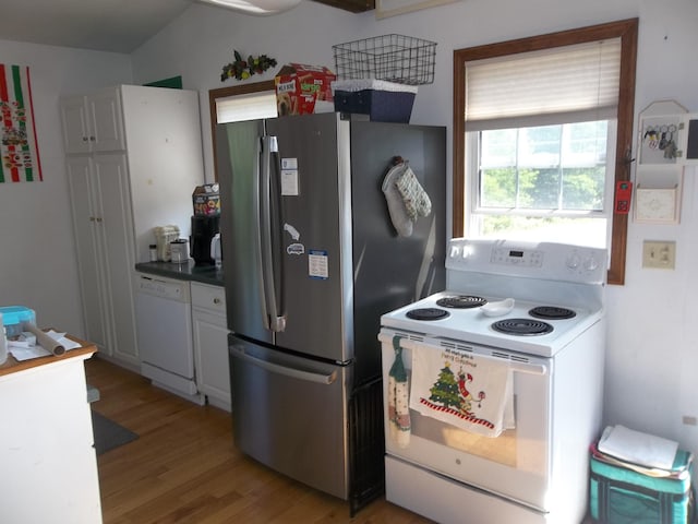 583 River Rd, Calais, ME 04619 - kitchen with white appliances, light wood-style floors, white cabinetry, and dark countertops