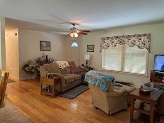 408 Chopps Cross Rd, Woolwich, ME 04579 - living room with ceiling fan and light wood-style floors