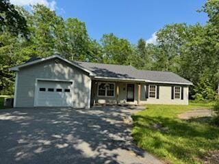 408 Chopps Cross Rd, Woolwich, ME 04579 - single story home featuring a garage, driveway, and a front yard