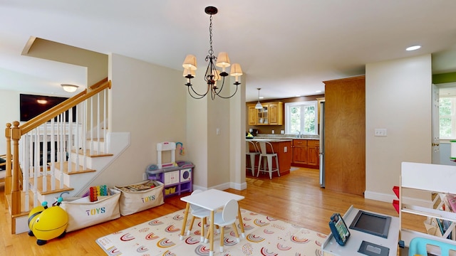 3 Marr Farm Way, Scarborough, ME 04074 - rec room with light wood-type flooring, a chandelier, healthy amount of natural light, and recessed lighting