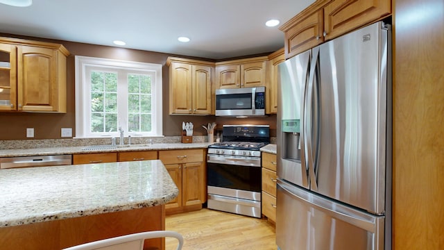 3 Marr Farm Way, Scarborough, ME 04074 - kitchen with appliances with stainless steel finishes, light wood-style floors, light stone counters, and recessed lighting