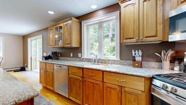 3 Marr Farm Way, Scarborough, ME 04074 - kitchen with stainless steel appliances, healthy amount of natural light, a baseboard radiator, light wood-style flooring, and recessed lighting
