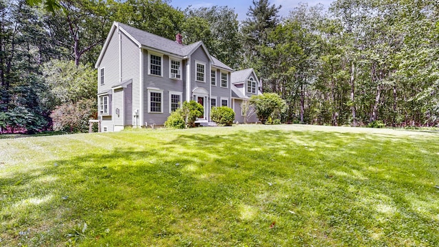 3 Marr Farm Way, Scarborough, ME 04074 - colonial inspired home with a front lawn, a chimney, and view of wooded area