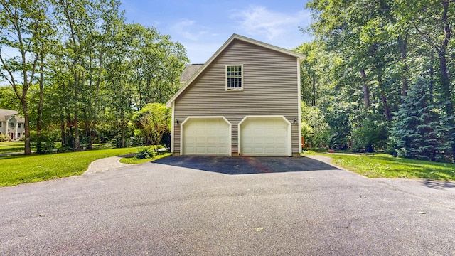 3 Marr Farm Way, Scarborough, ME 04074 - view of side of property with asphalt driveway, a lawn, and a garage