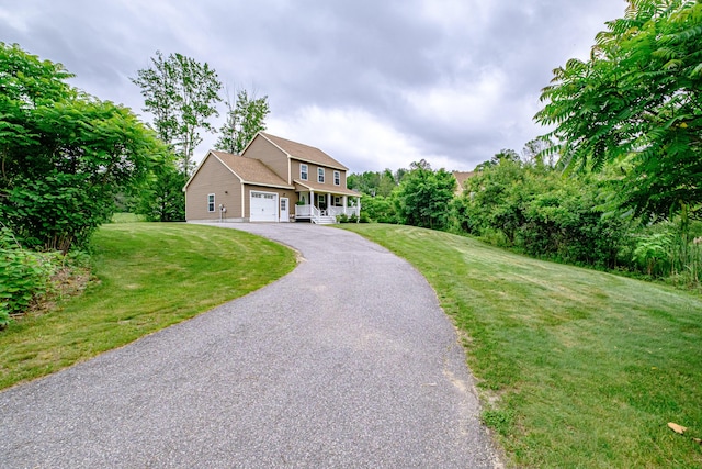 164 State St, Gorham, ME 04038 - colonial inspired home with driveway, a front lawn, and a garage