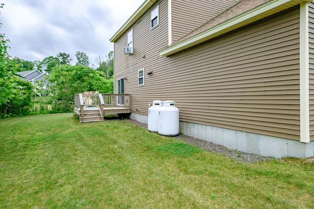 164 State St, Gorham, ME 04038 - view of grassy yard featuring a wooden deck and cooling unit