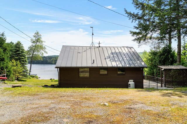 76 Colony Rd, Belgrade, ME 04917 - view of outbuilding featuring a water view