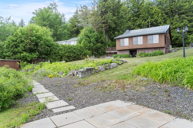 76 Colony Rd, Belgrade, ME 04917 - view of grassy yard with a wooden deck