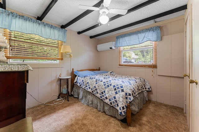 76 Colony Rd, Belgrade, ME 04917 - carpeted bedroom featuring an AC wall unit, beamed ceiling, and ceiling fan
