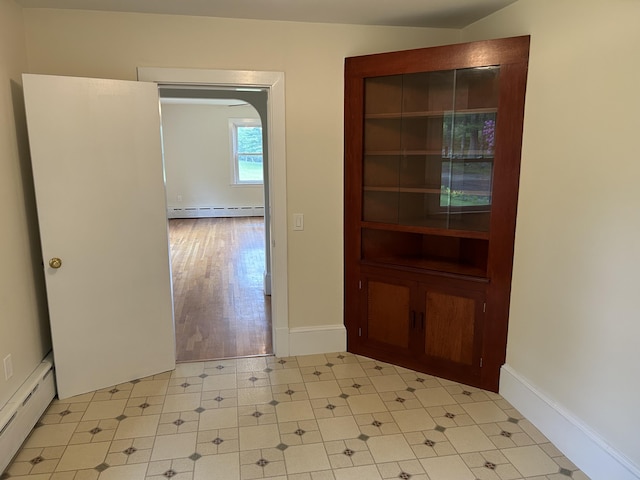 323 Montsweag Rd, Woolwich, ME 04579 - foyer with baseboard heating and light tile patterned floors