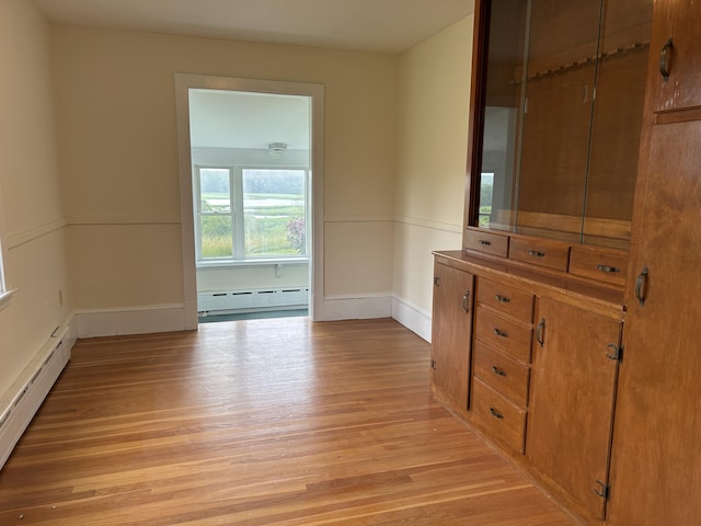 323 Montsweag Rd, Woolwich, ME 04579 - spare room featuring baseboard heating and light wood finished floors