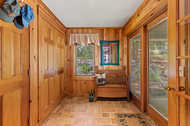 59 Wild Acres Rd, Raymond, ME 04071 - foyer entrance with stone tile flooring and wood walls