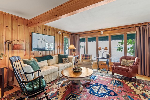 59 Wild Acres Rd, Raymond, ME 04071 - living area with wooden walls and wood finished floors
