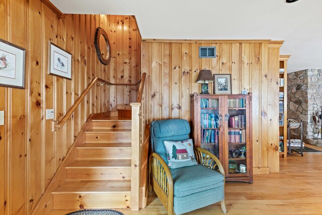 59 Wild Acres Rd, Raymond, ME 04071 - staircase featuring wood finished floors and wooden walls