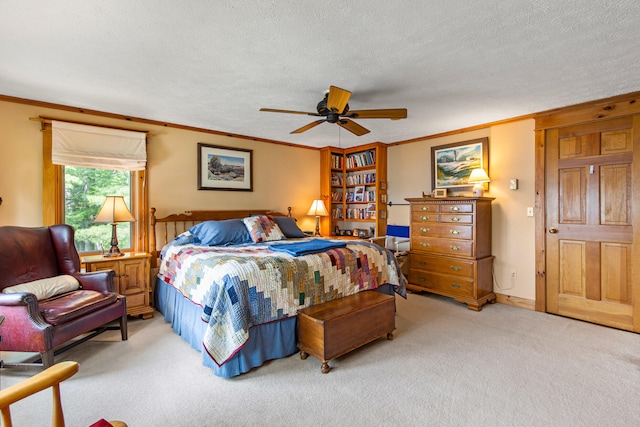 59 Wild Acres Rd, Raymond, ME 04071 - bedroom featuring crown molding, light carpet, a textured ceiling, and a ceiling fan
