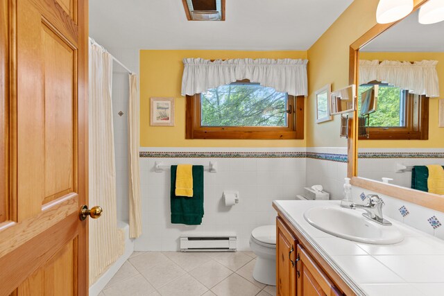 59 Wild Acres Rd, Raymond, ME 04071 - full bath featuring a baseboard radiator, tile patterned floors, vanity, a wainscoted wall, and shower / bathtub combination with curtain