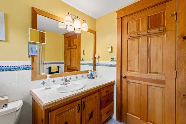 59 Wild Acres Rd, Raymond, ME 04071 - bathroom with vanity and tile walls