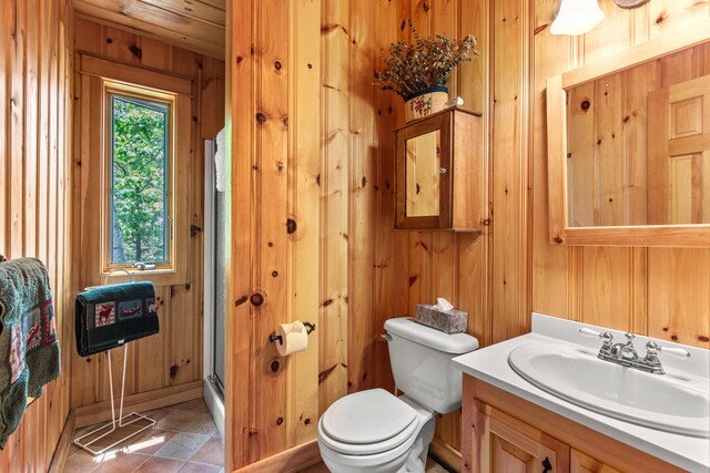 59 Wild Acres Rd, Raymond, ME 04071 - full bathroom with wood walls, vanity, and a shower with shower door