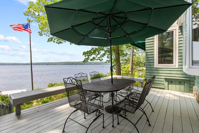 59 Wild Acres Rd, Raymond, ME 04071 - wooden deck featuring a water view and outdoor dining space