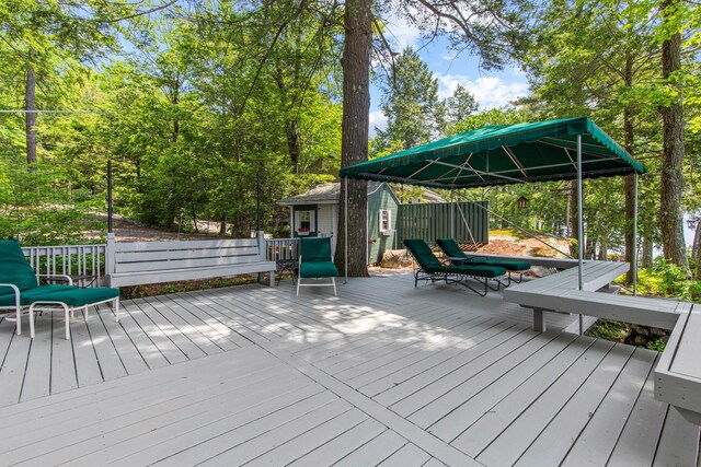 59 Wild Acres Rd, Raymond, ME 04071 - wooden deck featuring an outdoor structure and a gazebo