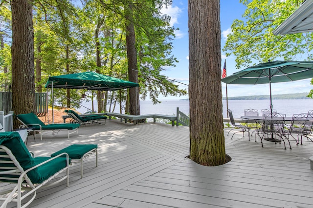 59 Wild Acres Rd, Raymond, ME 04071 - wooden deck featuring a water view and outdoor dining space
