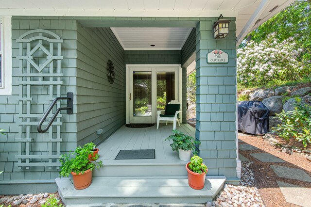 59 Wild Acres Rd, Raymond, ME 04071 - doorway to property with covered porch