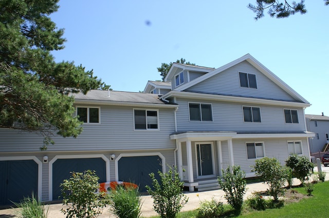 17 White Cap Ln, Wells, ME 04090 - view of front of property featuring a garage and driveway