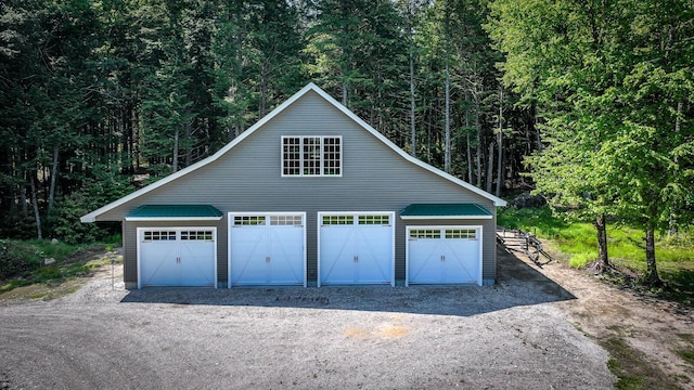 115 Fuller Ln, Denmark, ME 04022 - detached garage featuring a forest view