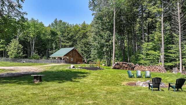 115 Fuller Ln, Denmark, ME 04022 - view of yard with a forest view and an outdoor structure