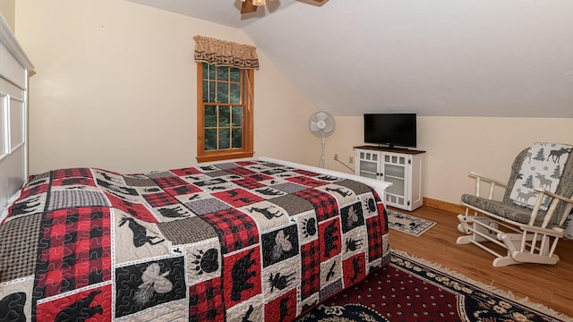115 Fuller Ln, Denmark, ME 04022 - bedroom with wood finished floors, lofted ceiling, and ceiling fan