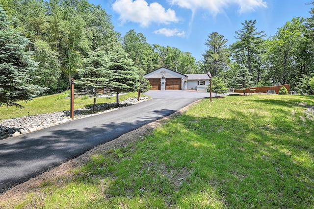 10 Tenacious Way, Augusta, ME 04330 - ranch-style home with a front lawn and a garage